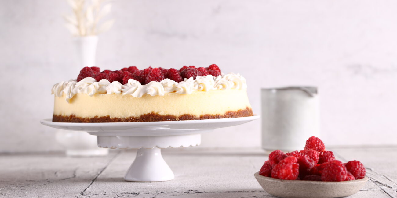 Vanilla Bean Cheesecake with a Triple Berry Glaze